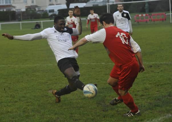 Georges Gouet goes in for a tackle during Bexhill United's 2-0 win at home to Seaford Town last weekend. Picture by Simon Newstead