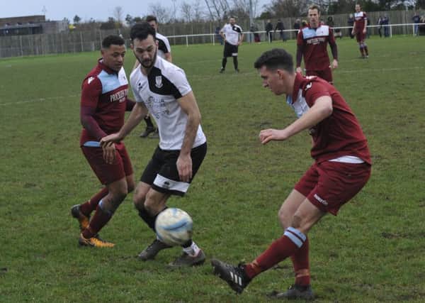 Action from Little Common's last outing, the 2-0 win at home to Bexhill United on Boxing Day. Picture by Simon Newstead