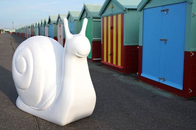 One of the snail's in front of Hove beach huts