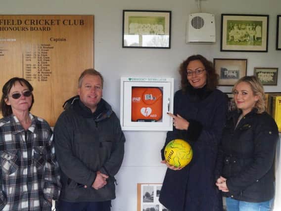 From left, Sheila Hewer, playing fields secretary, Guy Nelson, chairman of playing fields committee and cricket club, Charlotte Brumwell-Clark, Watersfield Football Club treasurer and secretary and Anne Miller, from UK Power Networks.