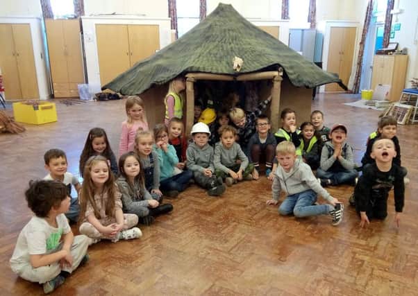 East Preston Infant School pupils with the roundhouse they helped to build