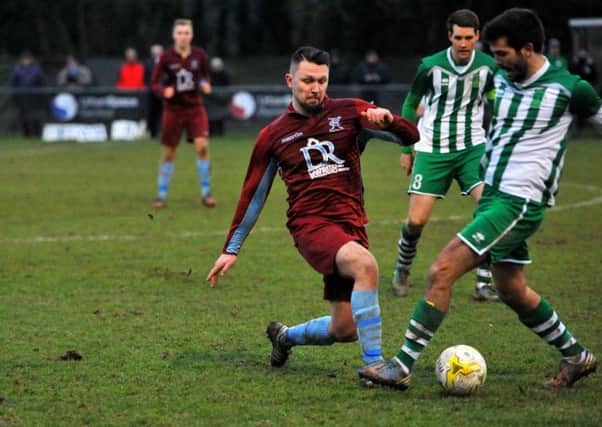 Lorenzo Dolcetti on the ball for Chi City at Horley / Picture by Steve Robards