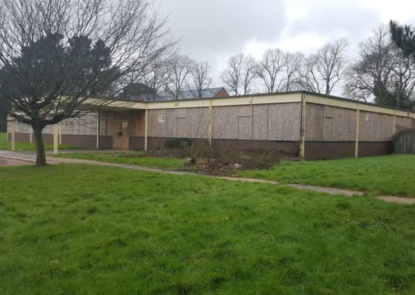 Derelict former NHS buildings on the lower Graylingwell site where 160 homes are set to be built