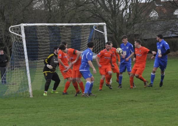 Battle Baptists defend a corner during their 2-0 win away to Sidley United. Pictures by Simon Newstead