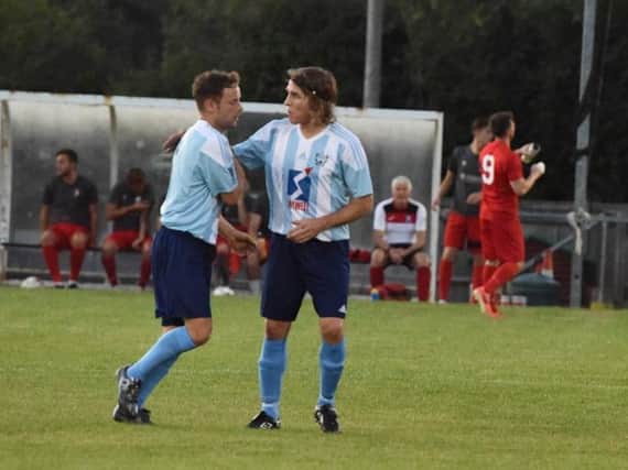 Justin Gregory (right) in action for Worthing United last season. Picture by Phil Westlake (PW Sporting Photography)