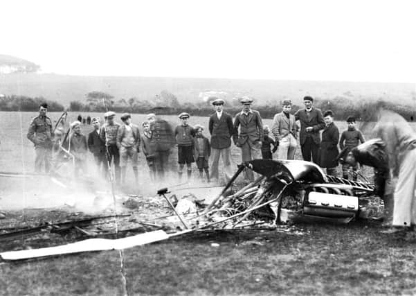 The wreckage of Edwin Sandss aeroplane after the crash in 1934, which he miraculously  escaped from with only a broken ankle, some burns and other minor injuries