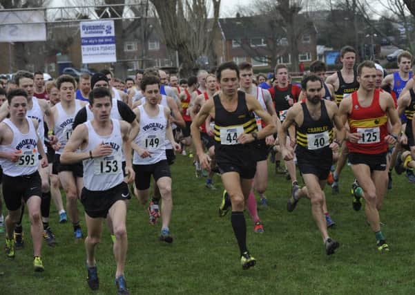 The field sets off in the senior men's race at the Sussex Cross-Country Championships including third-placed Ross Skelton (white Phoenix vest, 153). Picture by Simon Newstead