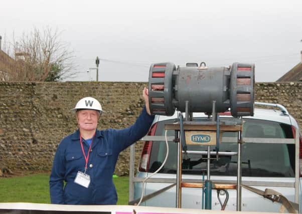 Norman Langridge with the air raid siren at Broadwater Church of England Primary School