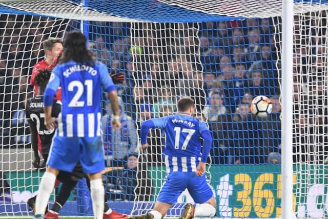 The ball goes in off Glenn Murray for Brighton's winner. Picture by Phil Westlake (PW Sporting Photography)