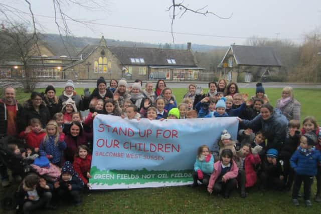 Parents and children in Balcombe protesting against the plan