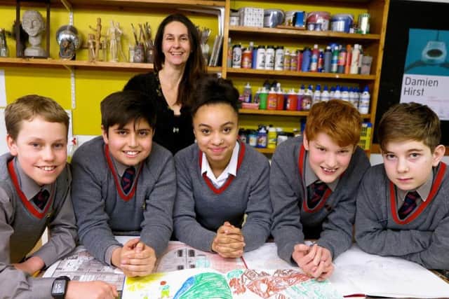 Andrea Tewkesbury, head of art, with the year-eight pupils whose work was selected, from left, George Bryant-Nichols, Ethan Roberts, Chloe Macklin, Jonny Townsend and Oliver Knight