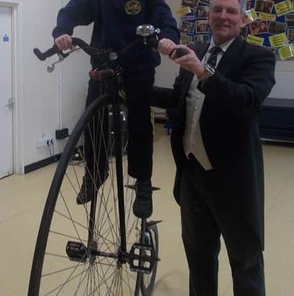 Children then had the opportunity to sit on the penny-farthing and experience how high it is