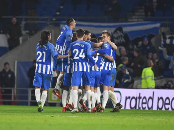 Albion players celebrate Glenn Murray's winner in the FA Cup triumph over arch-rivals Crystal Palace on Monday. Picture by Phil Westlake (PW Sporting Photography)
