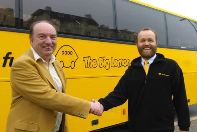 Former Lewes MP shakes hands with The Big Lemon chief executive Tom Druitt