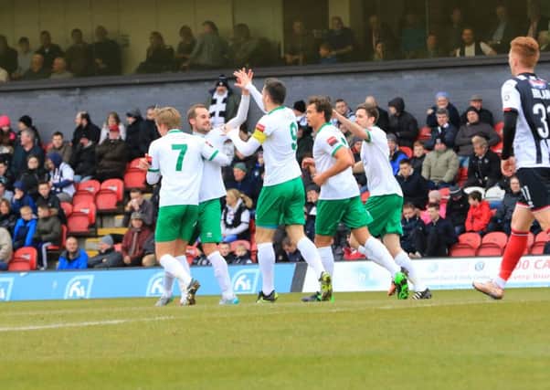 The Rocks celebrate a goal at Grimsby in their 2016 Trophy semi-final second leg / Picture by Tim Hale