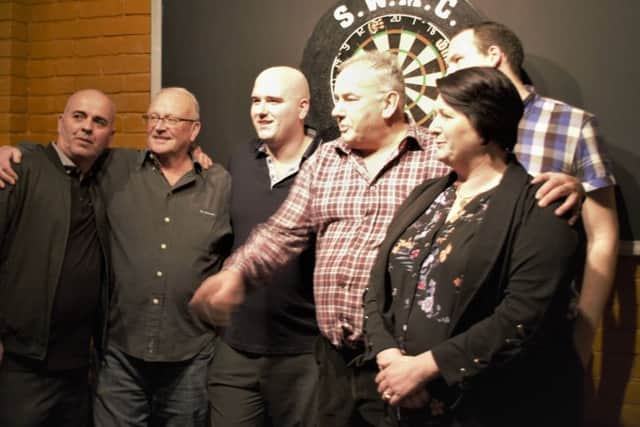 Rob Cross (third-from-left) with his parents and a couple of Sidley Working Men's Club representatives. Picture courtesy Liz Kelly
