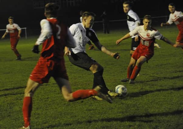 Gordon Cuddington on the ball during Bexhill United's last outing, a 2-0 win at home to Seaford Town 13 days ago. Picture by Simon Newstead