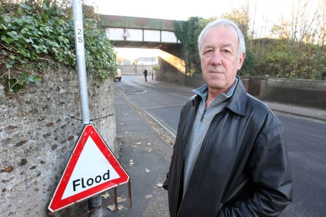 Will Flewett at the junction of Southdown Road and Western Road where the road floods regularly