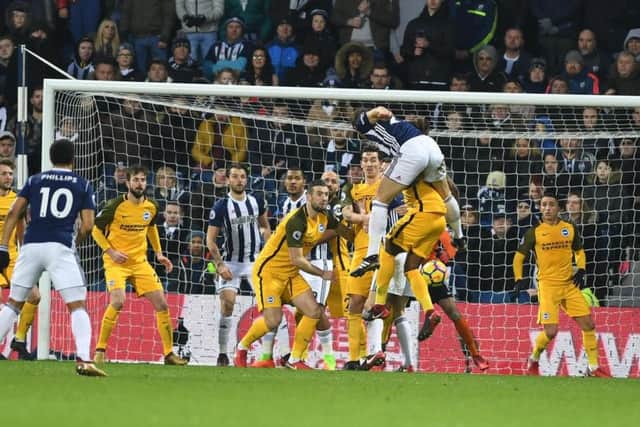 Craig Dawson heads home West Brom's second. Picture by Phil Westlake (PW Sporting Photography)