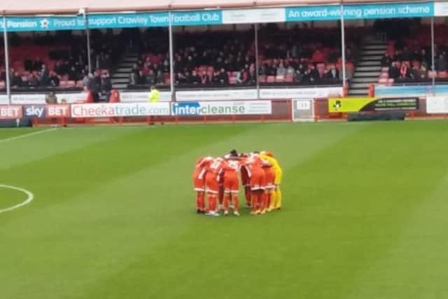 Crawley Town have a huddle before kick-off.
Picture by Sam Morton.