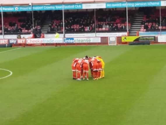 Crawley Town have a huddle before kick-off.
Picture by Sam Morton.