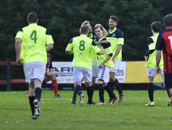 St Francis Rangers players celebrate Ross Jones second goal on Saturday. Picture by Stephen Goodger