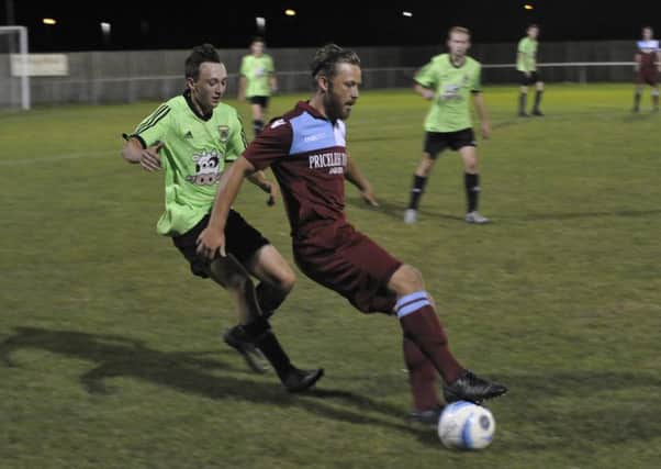 Action from the original meeting between Little Common and Ringmer back in September, a match which was abandoned due to a floodlight failure.