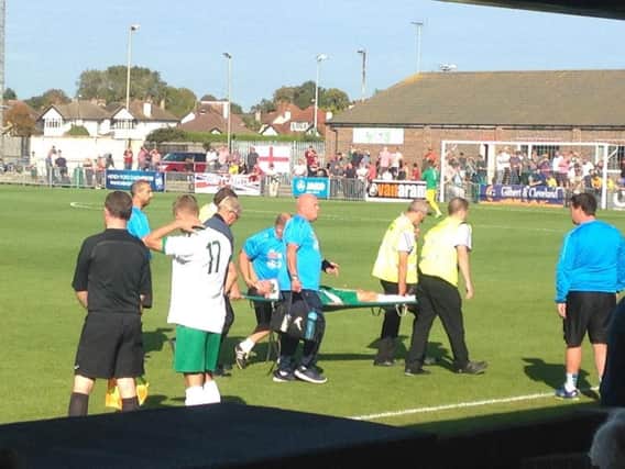 James Crane is taken off on a stretcher after dislocating his shoulder last September