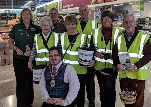 Billy with Friends of Mewsbrook Park and staff from Morrisons collecting at the store