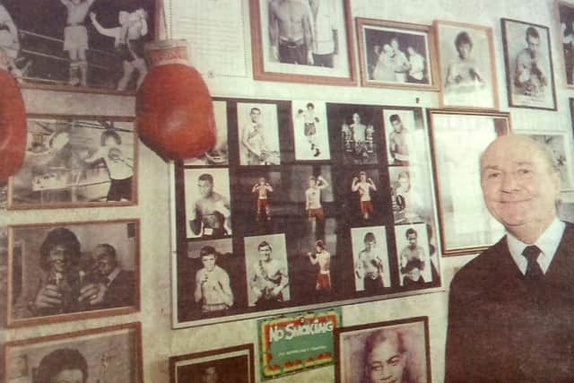 John Hillier and some of his boxing memorabilia
