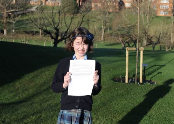 Budding author and Cranleigh prep School pupil Charlotte Tis set to have her story published in March SUS-180123-160049001