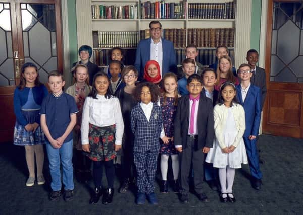Children who took part in Child Genius 2017 and the programme's presenter Richard Osman. SUS-180124-112200001