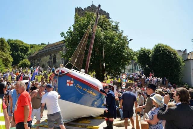 The moving of the Cyril and Lilian Bishop lifeboat to its final resting place on the corner of Harold Road/Old London Road. Photo by Sid Saunders. SUS-170724-134733001