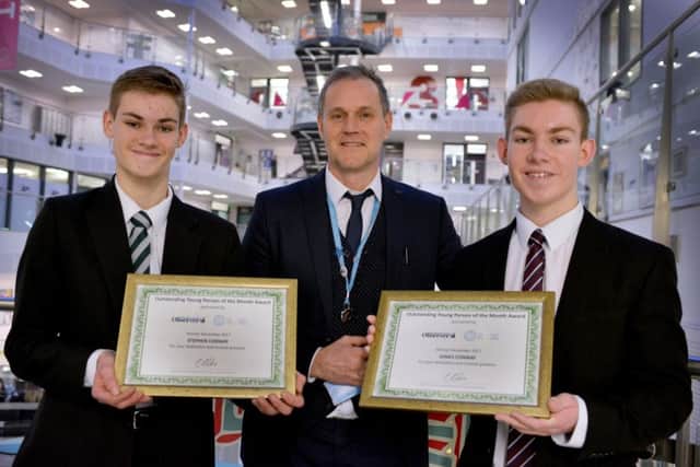 Stephen Conway (left) and James Conway (right) with Justin Rollings (centre) from Sussex Coast College presenting the awards