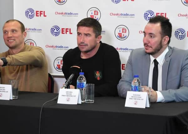 Crawley Town director of football Selim Gaygusuz, right, with head coach Harry Kewell and assistant Warren Feeney.
Picture by PW Sporting Photography