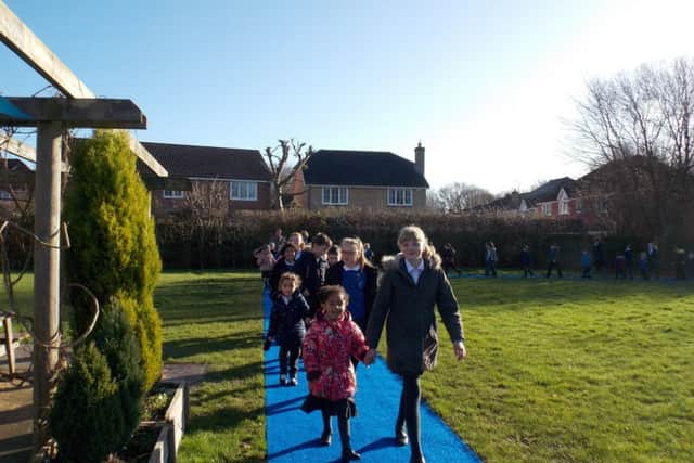 Paul Sinton-Hewitt CBE opened Castlewood Primary School's new track SUS-180122-140458001