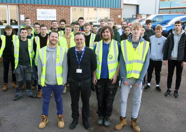 Gas and plumbing apprentices with teachers Kevin Smith and Darren Paine. Picture: Derek Martin