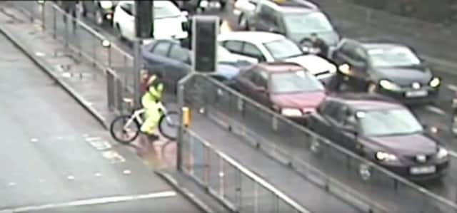 CCTV captured the shocking moment a car crashed into queuing traffic in Crawley.