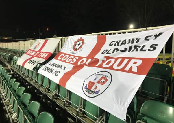 Crawley Town flags on display at Newport. Picture by Steve Herbert SUS-180122-225118002