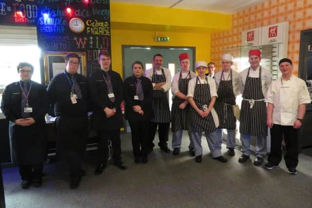 Zach with Chef and the college students who prepared the winning menu SUS-180123-095303001