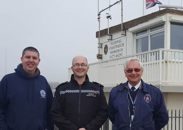 Station manager Laurie Hays, right, and Gary Baines, chairman of the Friends of Shoreham Fort, with PCSO Daryl Holter