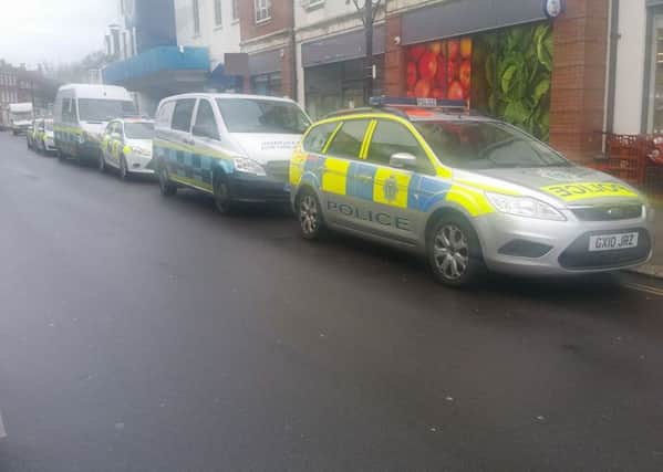 Police and immigration enforcement vans in Rowlands Road, Worthing. Picture: Adur and Worthing Police -aTFpl6PJW4BD54iDDgf