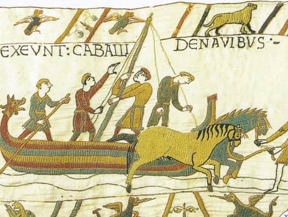 A section of the Bayeux Tapestry showing William landing in Pevensey