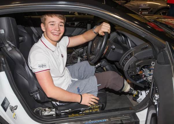 Autosport International Exhibition. National Exhibition Centre, Birmingham, UK. 
Friday 12th January 2017. 
Billy Monger preparing to go into the Live Action Arena with Terry Grant.
World Copyright: Joe Portlock/LAT Images 
ref: Digital Image _L5R9203 SUS-180122-074611002