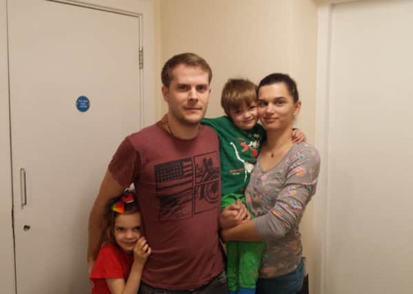 Tom Hunter with his wife and their two children at their home in Lloyd Road in Chichester