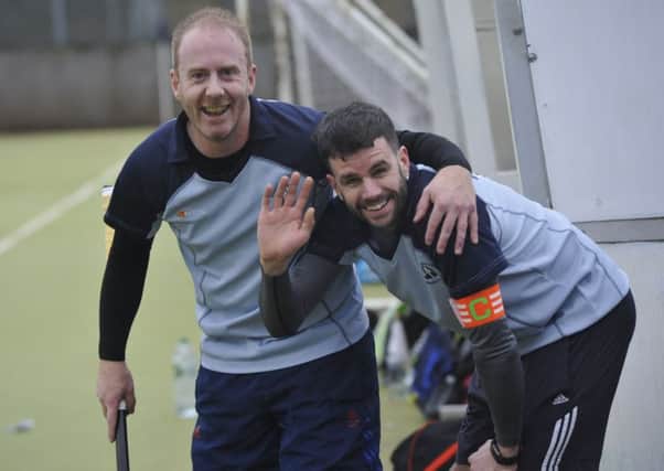Andrew Acott (left) and Paddy Cornish have plenty to smile about during South Saxons' 6-0 victory over Holcombe III (2). Pictures by Simon Newstead