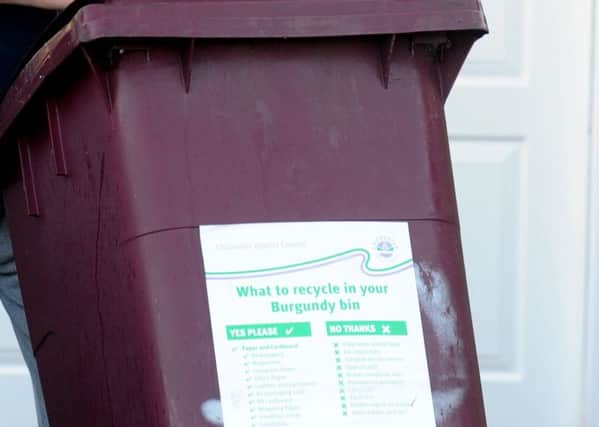 Burgundy recycling bin