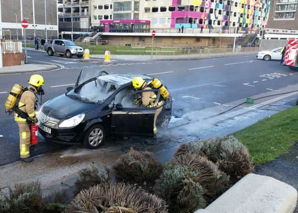 Firefighters tackled a car fire in Marine Parade, Worthing this afternoon. Picture: Christine Hodges r0_Z52SgV-Mu8JM3ZZkl