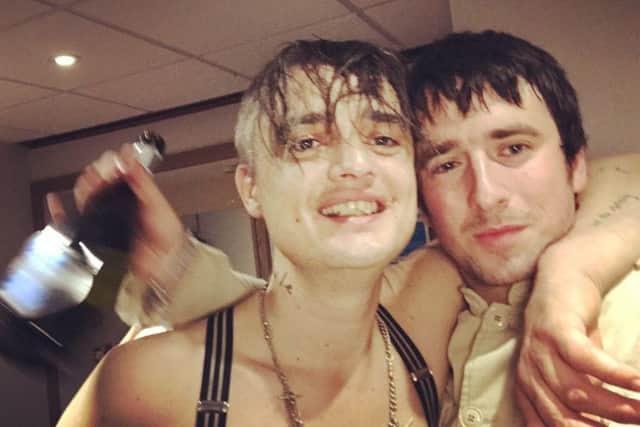 Pete Doherty of The Libertines and The Magic Mod Ben Taylor on the last night of The Libertines tour SUS-180126-125847001