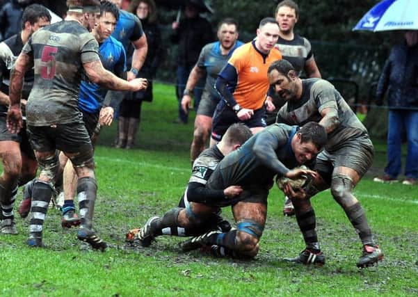 Aaron Davies goes for glory in the mud / Picture by Kate Shemilt 180027-5